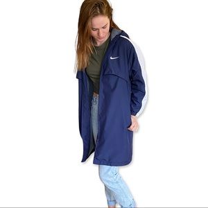 Nike coat trench parka style rain coat. Size small. Navy and white.